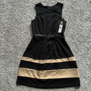 IZByer black and tan sleeveless dress. Belted. Size 3. Keyhole cutout on front.
